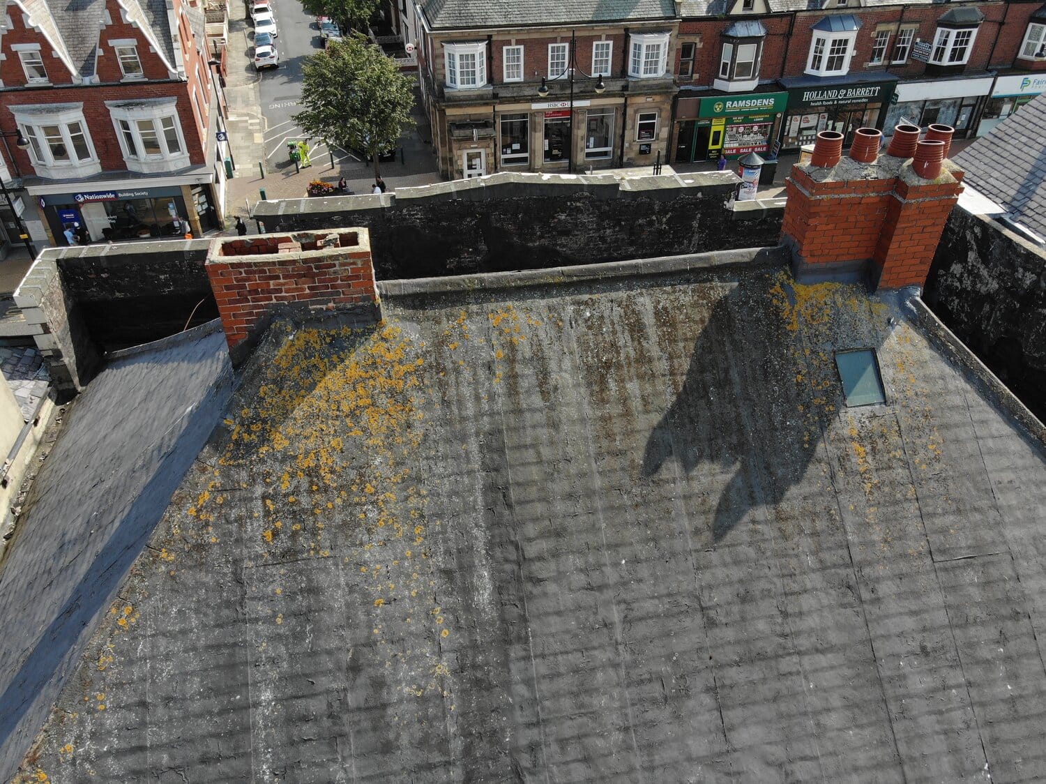 Commercial building drone inspection of a high-street roof